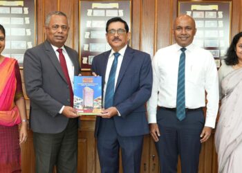 People’s Bank presents the Economic Review magazine to CBSL Governor 
